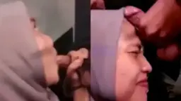 Zilla Berhijab Mengulum Batang dan Menyemprotkan Cairan di Wajah
